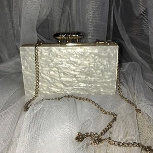 Clutch bag with gold chain